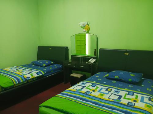 Postel nebo postele na pokoji v ubytování Hotel Antik