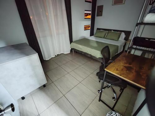 Postel nebo postele na pokoji v ubytování Schultz Apartamento