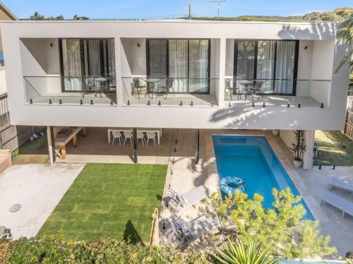 an aerial view of a house with a swimming pool at Bonnyvale Dune Retreat I Ocean Grove in Ocean Grove
