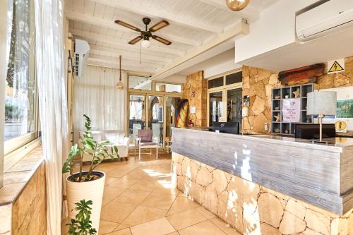 En restaurant eller et andet spisested på Branco Suites - Rooms & Holiday Apartments