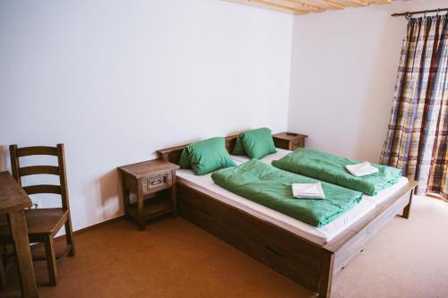 Säng eller sängar i ett rum på Apartmány Zuzka