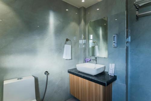 Et badeværelse på The Oasis Retreat