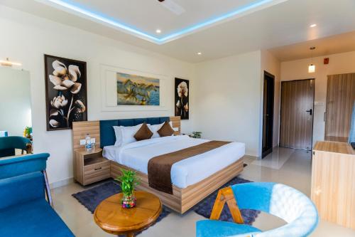 En eller flere senge i et værelse på The Oasis Retreat