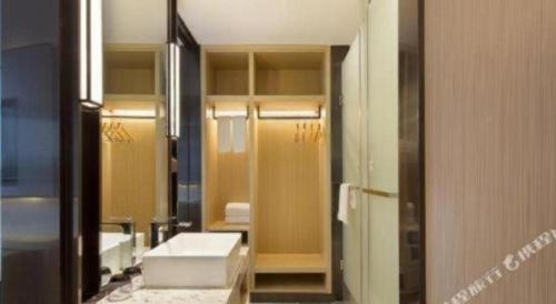 Ένα μπάνιο στο Echarm Hotel Changsha High-speed Railway Station