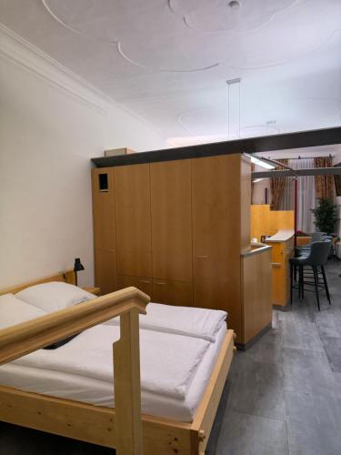 Postel nebo postele na pokoji v ubytování Apartments Lichtenstein