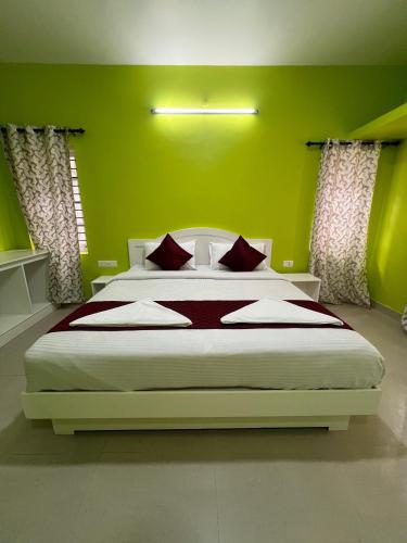 En eller flere senge i et værelse på Essar Cottage