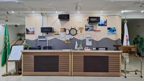 TV/trung tâm giải trí tại أرض الذهب للشقق المخدومة الرويضة