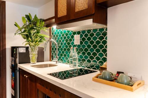 Η κουζίνα ή μικρή κουζίνα στο Maison Nhã 28 Mạc Đĩnh Chi