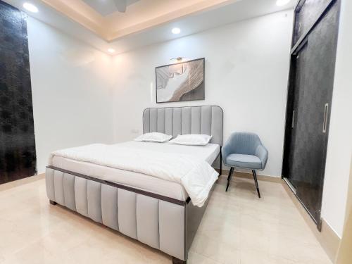 En eller flere senge i et værelse på The Boutique Stay