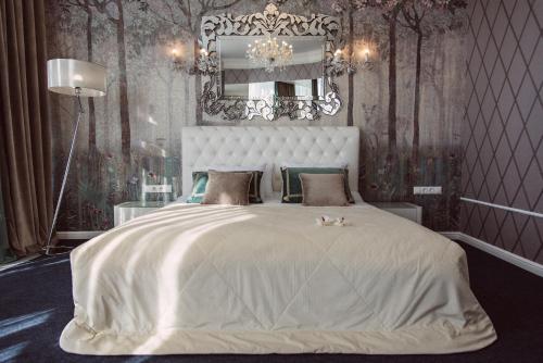 Кровать или кровати в номере Brigantina Hotel
