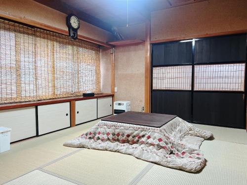 Η κουζίνα ή μικρή κουζίνα στο Jikka京都舞鶴