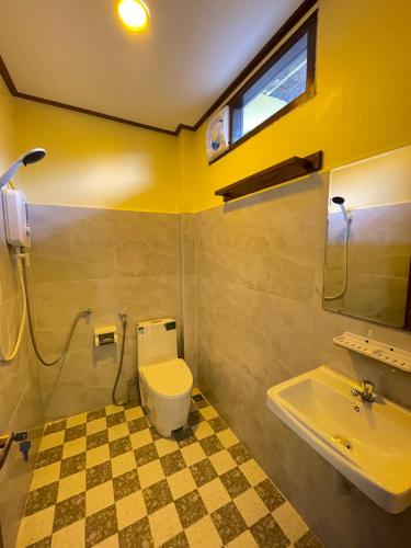 Koupelna v ubytování Tena Guest House