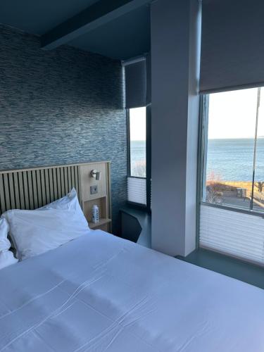 Ένα ή περισσότερα κρεβάτια σε δωμάτιο στο Carraig Townhouse