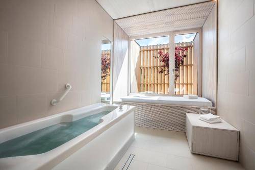 Ένα ή περισσότερα κρεβάτια σε δωμάτιο στο Gasthof zur Post