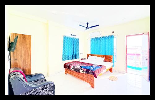 En eller flere senge i et værelse på The Manas Kanya Mandar Mani