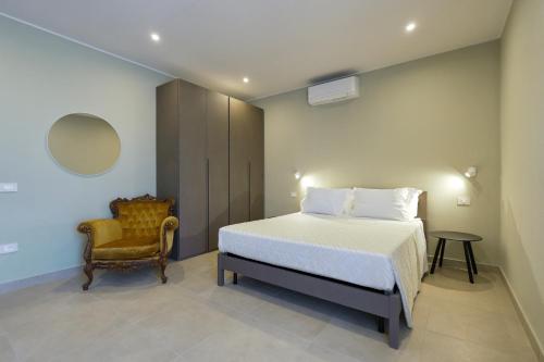 Giường trong phòng chung tại Domus Fabia - Rooms & Apartments
