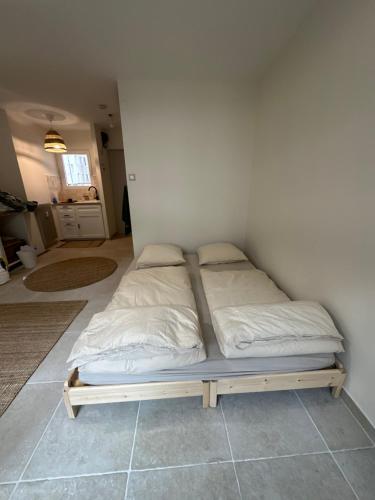 Postel nebo postele na pokoji v ubytování Studio