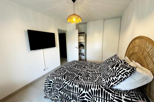 Appartement neuf, tv, wifi, clim, parking gratuit