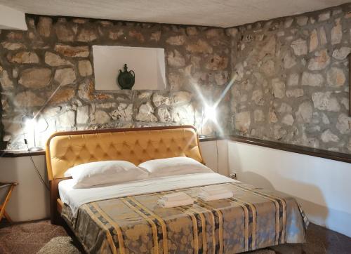 En eller flere senge i et værelse på Heritage Bella Vista beach house