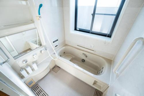 3 Minutes to Tamade Station Over 150sqm 3 Private Rooms Up to 11 Guests Namba 7 Minutes