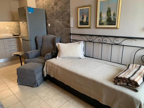 Ένα ή περισσότερα κρεβάτια σε δωμάτιο στο Holidays Pelion studio