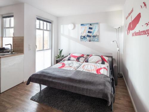 En eller flere senge i et værelse på Villa Brunnenhof 1