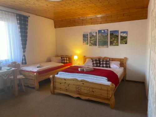 En eller flere senge i et værelse på Apartmán Otília