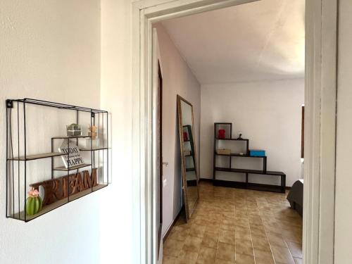 En eller flere senge i et værelse på Il portico del Lago