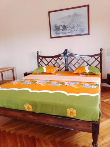 Postel nebo postele na pokoji v ubytování Green Garden Lodge