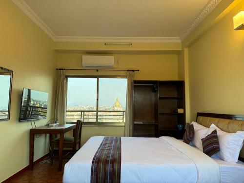 Katil atau katil-katil dalam bilik di Tise Hotel