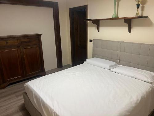 En eller flere senge i et værelse på Villetta a Sestola