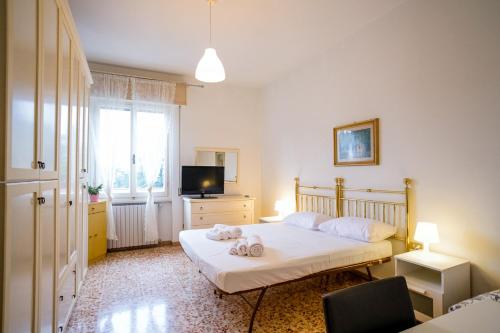 Ένα ή περισσότερα κρεβάτια σε δωμάτιο στο Rossi Boutique Apartment