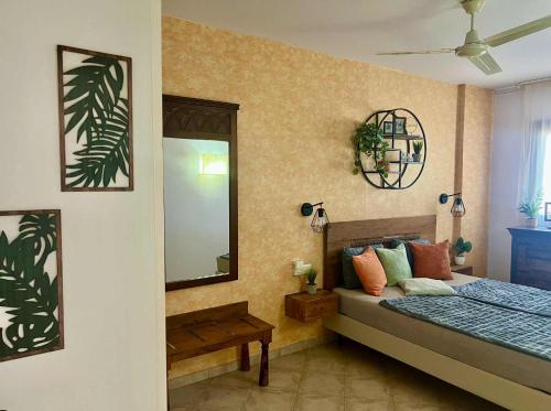 Llit o llits en una habitació de Tropical Palma