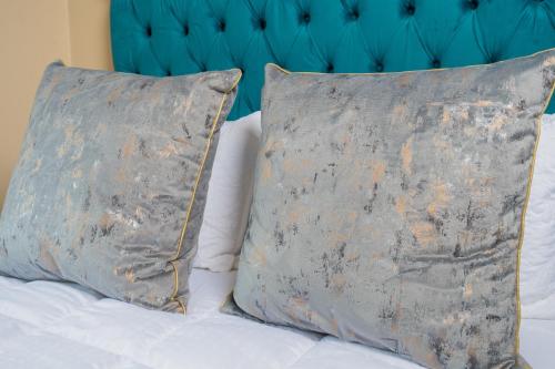 Ένα ή περισσότερα κρεβάτια σε δωμάτιο στο Chic Alberton