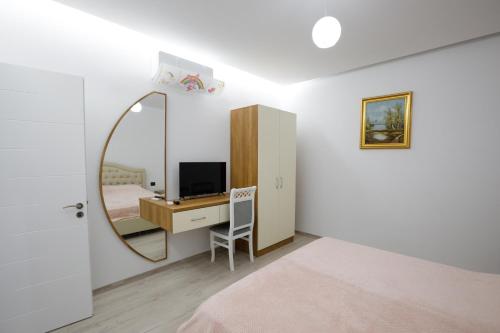 מיטה או מיטות בחדר ב-Edri Apartment