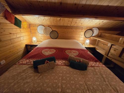 Postel nebo postele na pokoji v ubytování Gîte Haut Les Cœurs - Chalet dans les Hautes-Vosges