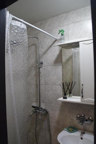 Et badeværelse på Квартира - студія