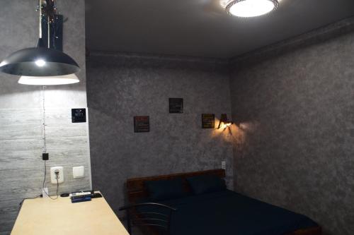 En eller flere senge i et værelse på Квартира - студія