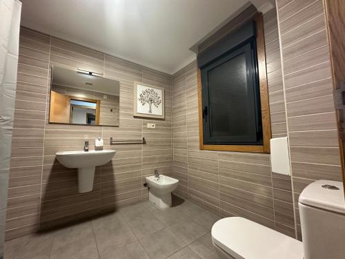 Et badeværelse på Pensión Villa Mayer - Grupo Arcanos