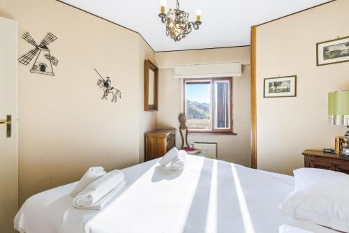 En eller flere senge i et værelse på Hostdomus-Star Apartment