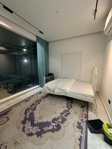 Postel nebo postele na pokoji v ubytování Al manama house 2