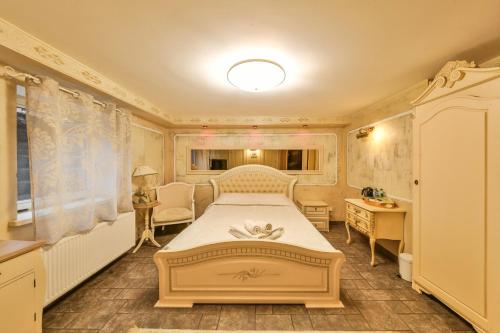 Postel nebo postele na pokoji v ubytování Viva Trakai