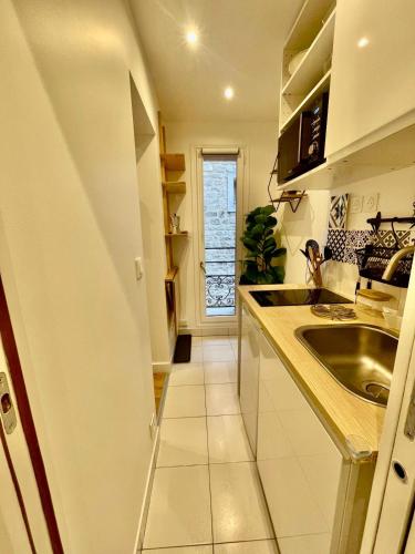 O bucătărie sau chicinetă la Cozy nest