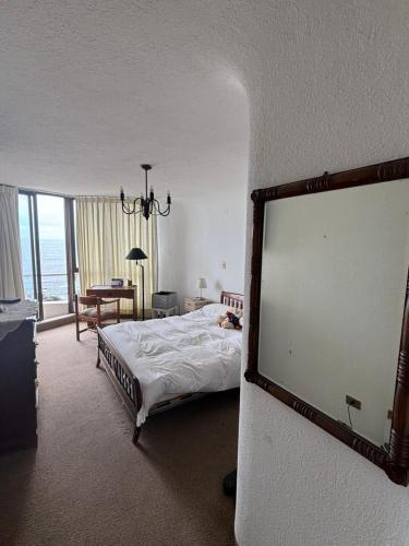 Postel nebo postele na pokoji v ubytování Family apartment with ocean view - luxury location