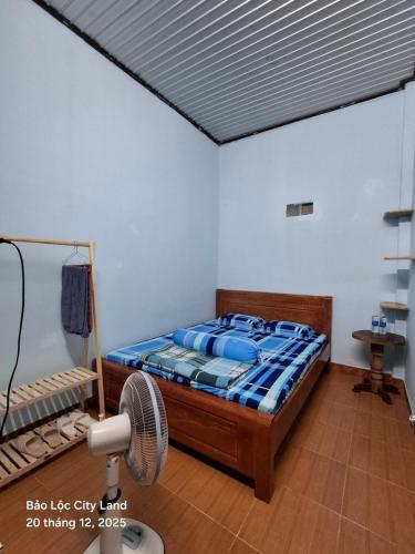 En eller flere senge i et værelse på Lương Y Trần Thúy Liên