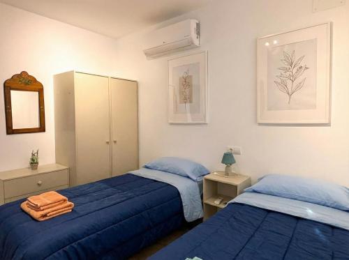 En eller flere senge i et værelse på Écija Confort by Casa Yaye