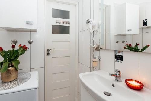 Koupelna v ubytování Apartamenty Szlachecki i Pod Artusem