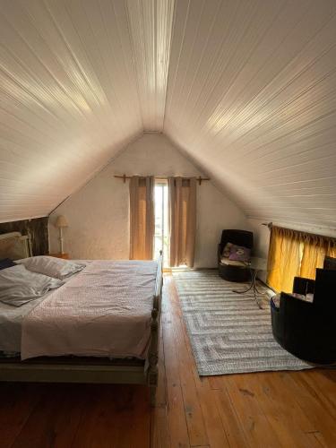 En eller flere senge i et værelse på Casa Punta Del Diablo