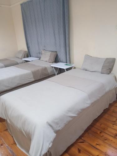 En eller flere senge i et værelse på 3 Laburnum lodge