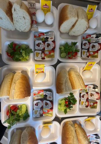 a refrigerator filled with different types of sandwiches at Mirşah Suit in Dalaman